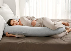 Detail of 7D hollow fiber filling in Momcozy pillow offers fluffiness and long-lasting shape.