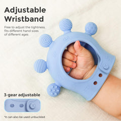 Momcozy teether wristband adjusted, secure grip for tiny hands.