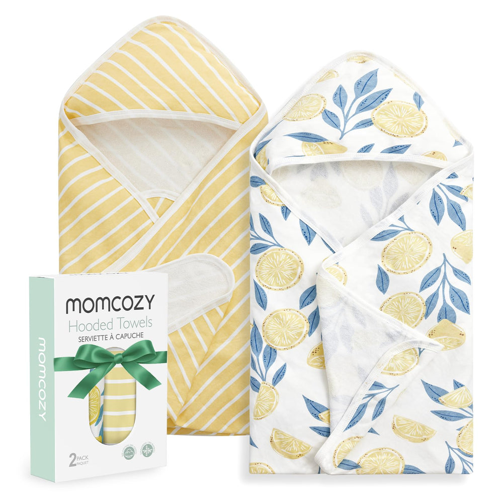 Momcozy hooded towel in Starry Sky design keeps baby warm after baths.