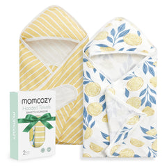 Momcozy hooded towel in Starry Sky design keeps baby warm after baths.