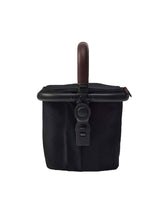 Momcozy ChangeGo basket clip secures tool-free attachment for clutter-free trips.