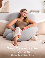Momcozy full-body support pillow offers plush yet stable sleep-ready shaping.