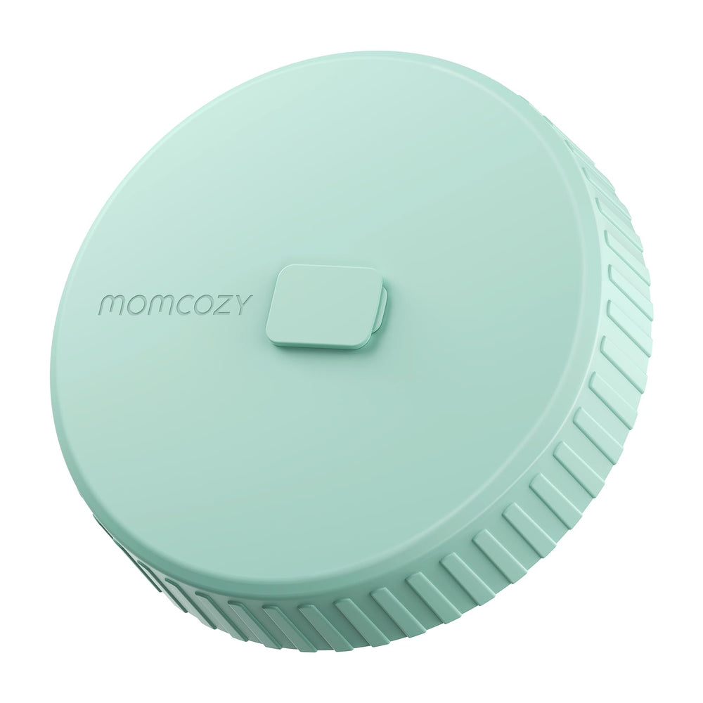 Momcozy glass milk pitcher lid close-up shows leak-proof seal for secure storage.