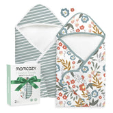 Momcozy hooded baby towel in Petite Blossom wraps infants in warmth after bath.
