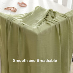 Momcozy muslin swaddle blanket neutral earth tones ideal for boy or girl.