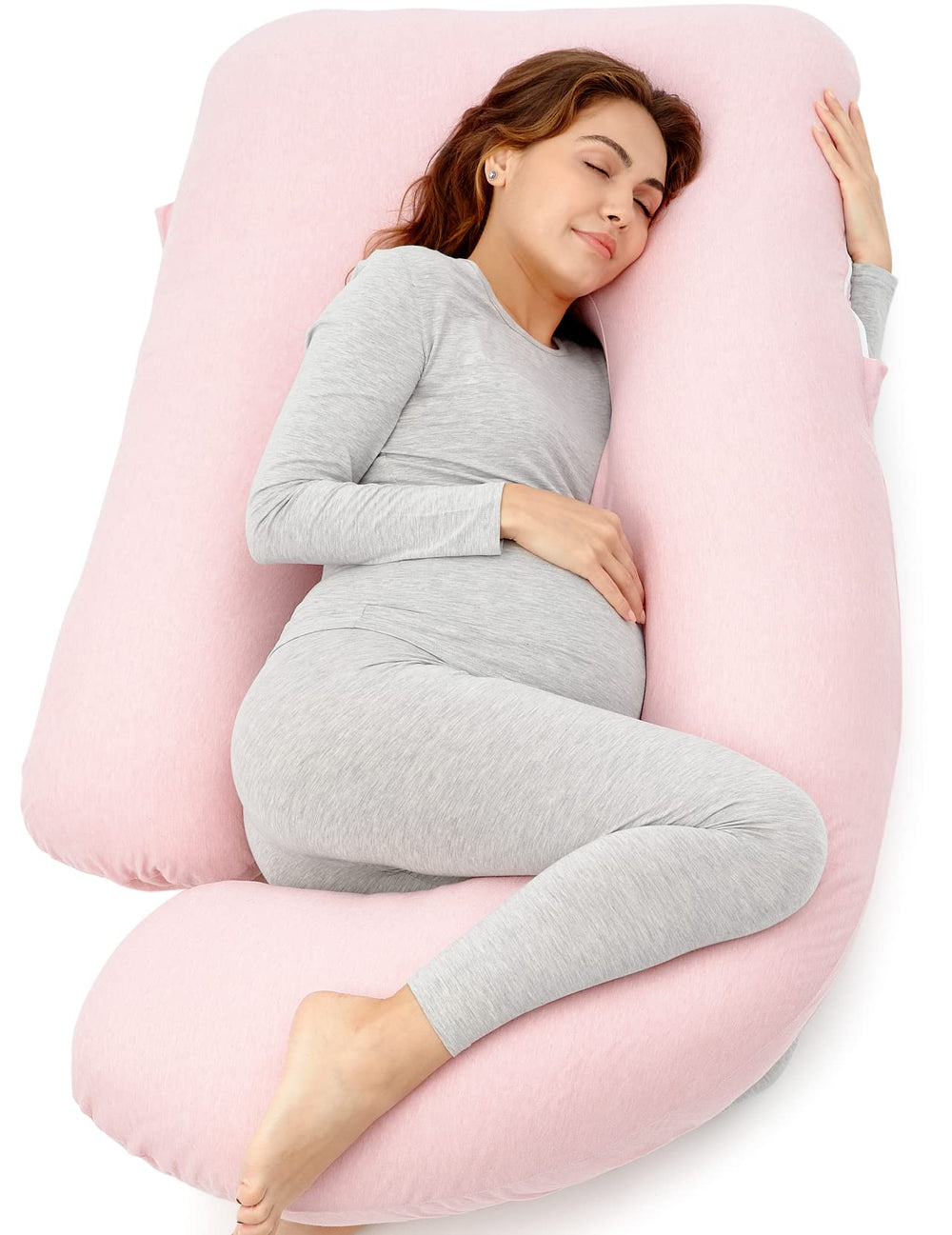Momcozy pregnancy pillow; U-shape full-body pink supports head and back.