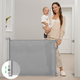 Momcozy retractable gate extended to 71 inches in doorway.