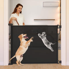 Momcozy retractable gate showing 71in-wide opening suitable for large doorways and stairs.