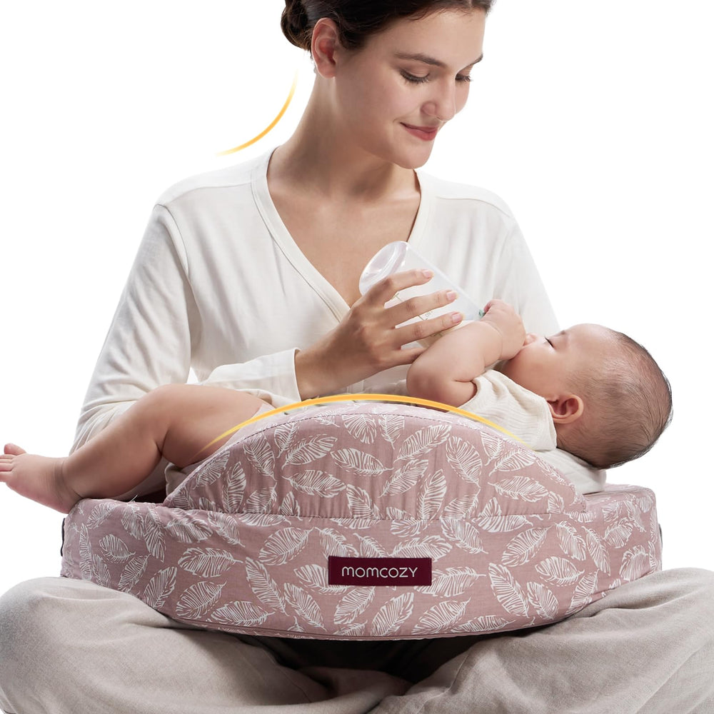 Momcozy Safety Guard Nursing Pillow shows ergonomic support for comfortable latching.