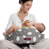 Momcozy Safety Guard Nursing Pillow cradling baby for secure latch and hands-free feeding