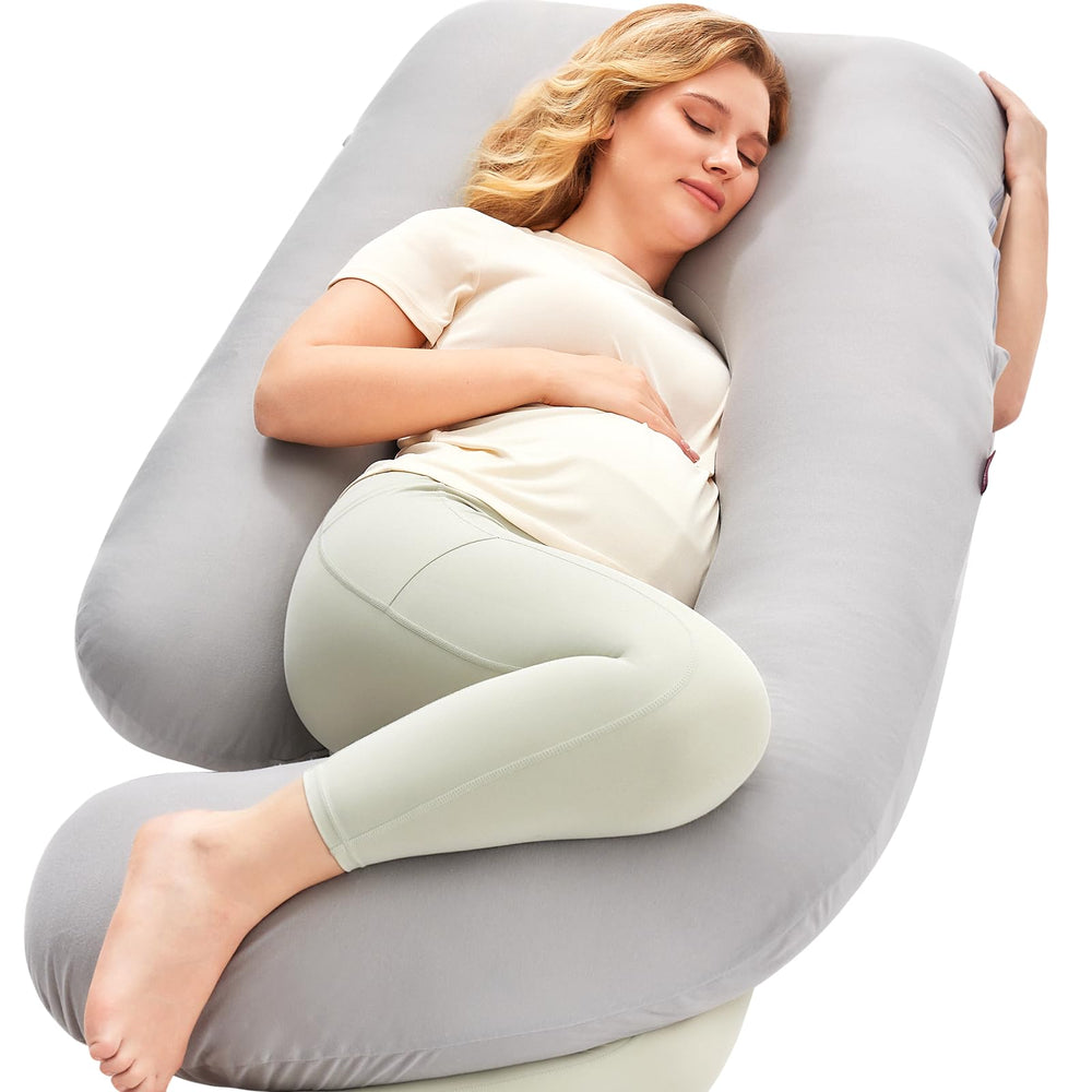 Momcozy U-shaped pregnancy pillow provides full-body support for better sleep.