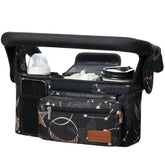 Momcozy universal stroller organizer in use with organized pockets for quick access.