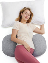 Momcozy W Shape pillow side-sleep close-up showing curved support for belly and back.