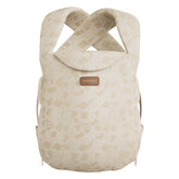 Momcozy WeeSnug newborn carrier showing secure-fit design for calm baby