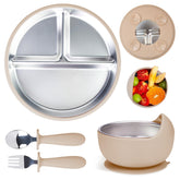 Momera stainless steel baby plate with suction base stabilizes meals on flat surfaces.
