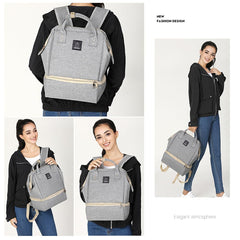 MOMIGO breast pump backpack grey side view, showing spacious interior