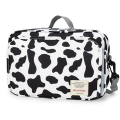 MOMIGO cow print diaper caddy with multi pocket design for easy travel organization.