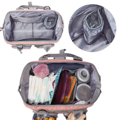 MOMIGO pink diaper bag backpack back view showing sturdy straps for comfort