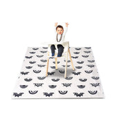 MOMIGO high chair splat mat in rainbow black, 43-inch coverage for clean dining areas.
