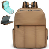 MOMINSIDE diaper bag backpack front view shows quilted design and quick-access pockets.