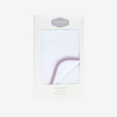 MOMS ON CALL swaddle blanket in peaceful lilac for cozy newborn wrapping.