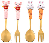Mom'so cool pig spoon in gold finish for playful family meals.