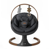 Monamii baby swing with wood grain design for stylish nursery ambiance.