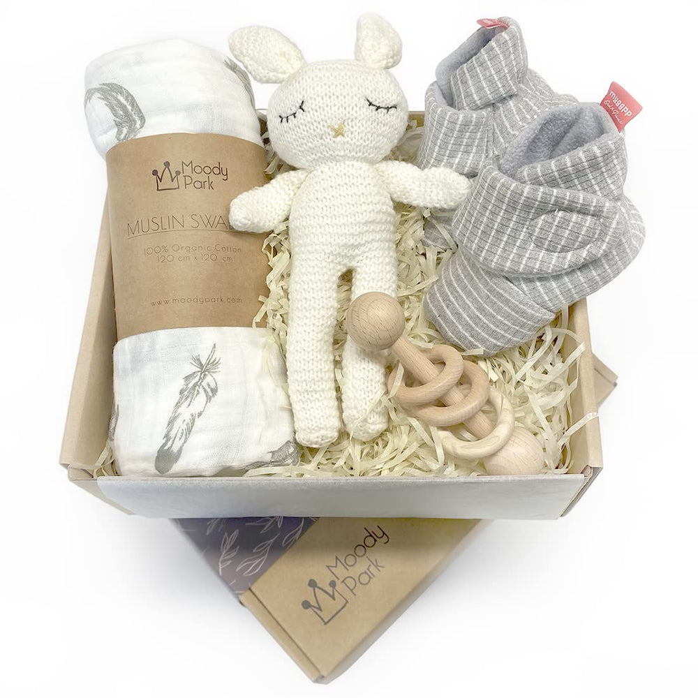 Moody Park baby gift basket swaddle blanket in soft organic cotton.