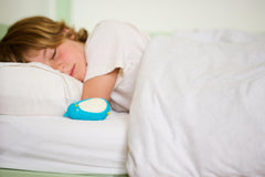 Moonbuddy in a bedtime scene supporting a quiet nighttime routine.
