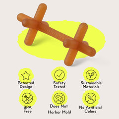 Moonjax teether on baby's gums offers gentle teething massage