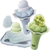 Moonkie baby fruit feeder with two pouches showing narrow-tip flow for safe self-feeding