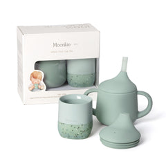 Moonkie baby training cup sippy in use promoting independent sipping