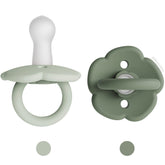 Moonkie two-pack pacifiers for easy daily replacement and hygiene.