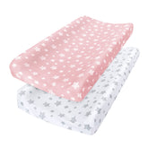 Moonsea changing pad cover 2-pack in pink pattern on pad offers cozy protection.