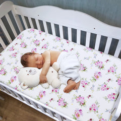 Moonsea crib sheets floral pattern adds vibrant color to the nursery for cozy bedtime.