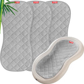 Moonsea quilted changing pad liner pack laid on changing table, non-slip and absorbent.