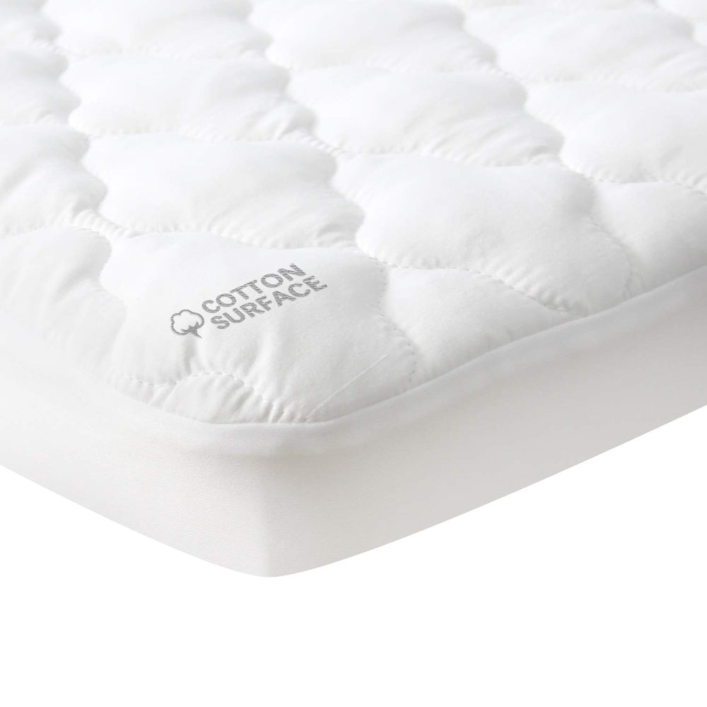 Moonsea mini crib mattress pad with waterproof layer protecting baby’s sleep area