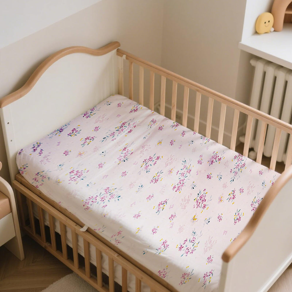 MorroMorn pink flowers crib sheet provides soft, cozy comfort for baby nights.
