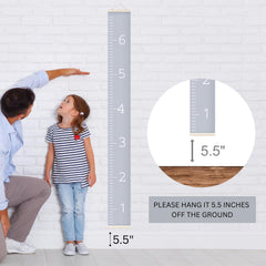 Morxy growth chart with wall-hanging string demonstrates easy installation and portability.