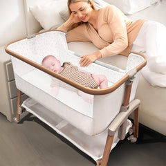 Motherly Haven bedside sleeper beside bed for easy nighttime soothing and feeding.
