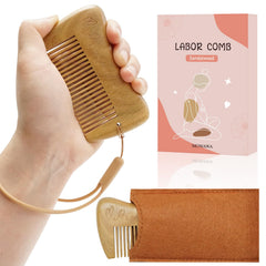 Mowawa sandalwood birthing comb close-up shows acupressure-focused teeth for labor comfort.