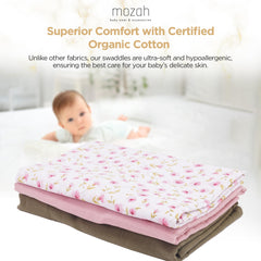 Mozah Organic Muslin Swaddle Blanket pink leaves detail, breathable double layer cotton.