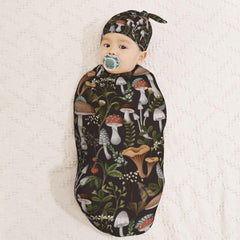 Muishi cocoon swaddle wrap in oval shape for secure soothing