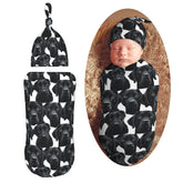 Muishi Labrador swaddle blanket for secure newborn sleep.