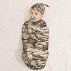 Close-up of Muishi duck camouflage swaddle fabric showing gentle material.