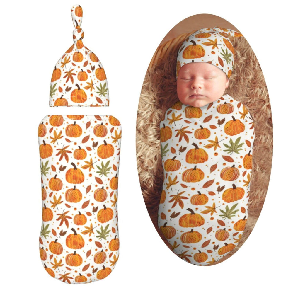 Muishi Fall Pumpkins swaddle blanket close-up reveals soft fabric and warmth.