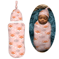 Muishi fox pink newborn hat set on baby for cozy warmth
