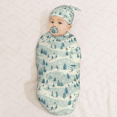 Muishi newborn hat swaddle set back view demonstrates easy wear