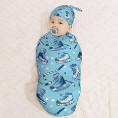 Muishi oval swaddle wrap helps secure the baby for peaceful sleep.