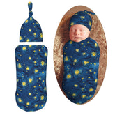 Muishi Star and Night newborn swaddle blanket cover with cozy fabric for peaceful sleep.